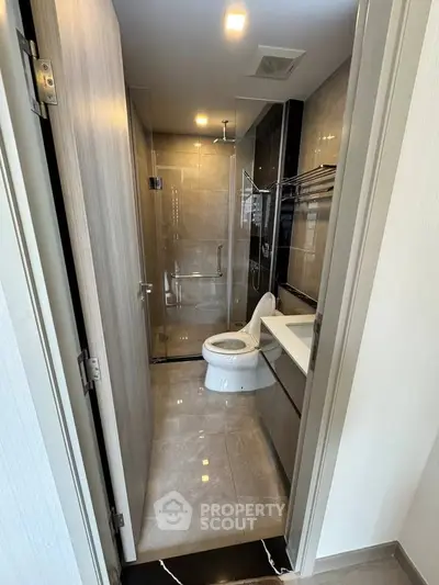 Modern bathroom with sleek design and glass shower enclosure