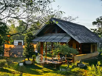 Charming rustic wooden cabin surrounded by lush greenery, perfect for nature lovers seeking tranquility.