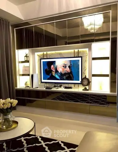 Luxurious living room with modern decor and elegant TV setup