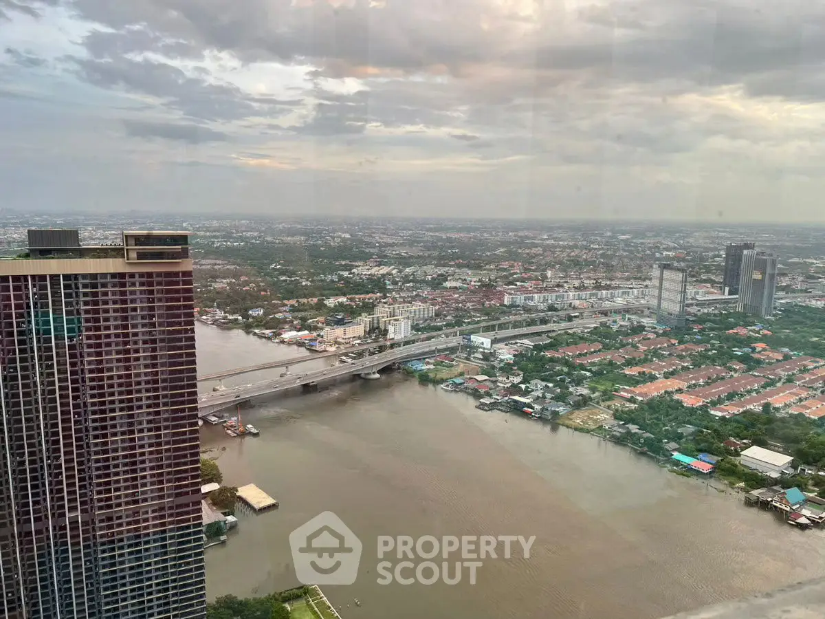 Stunning river view from high-rise building with expansive cityscape