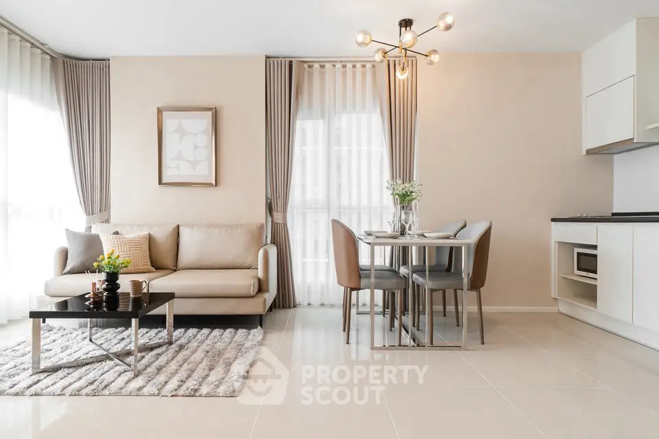 Modern living room with elegant dining area and stylish decor