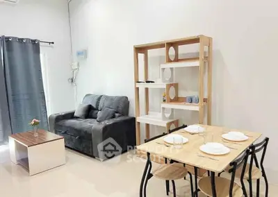 Modern living room with cozy sofa and stylish dining area