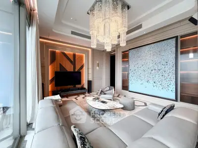 Luxurious modern living room with elegant chandelier and stylish decor