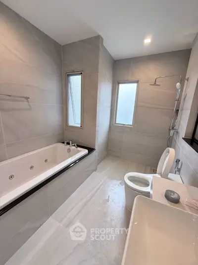 Luxurious modern bathroom with sleek design and spacious layout