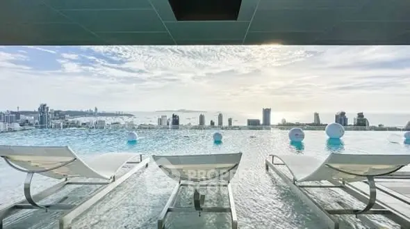 Luxurious rooftop infinity pool with stunning city skyline and ocean view.