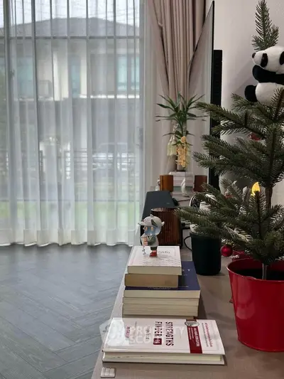 Cozy living room with modern decor and large window view
