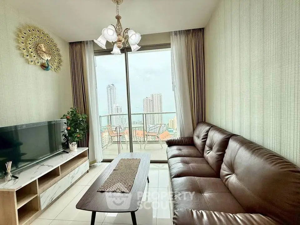Stylish living room with leather sofa and city view balcony in modern apartment.