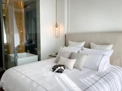 Luxurious bedroom with modern decor and elegant lighting