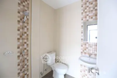 Modern bathroom with stylish tile accents and sleek fixtures