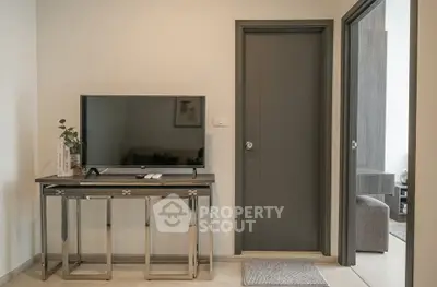 Modern living room with sleek TV stand and contemporary decor