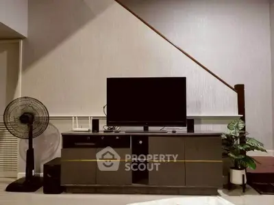 Modern living room with sleek TV stand and stylish decor