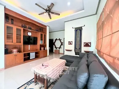 Spacious living room with modern decor and large sectional sofa