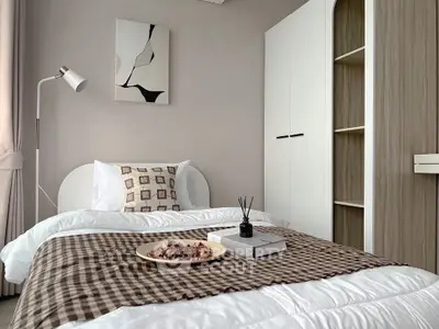 Cozy modern bedroom with stylish decor and natural light