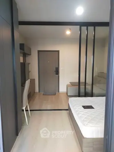 Modern bedroom with sleek design and comfortable furnishings