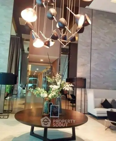 Luxurious modern living room with elegant lighting and stylish decor