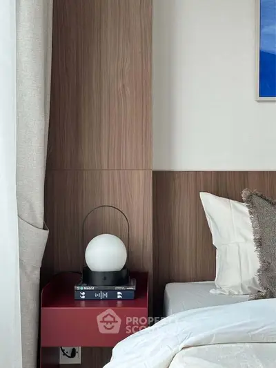 Modern bedroom with stylish nightstand and elegant decor