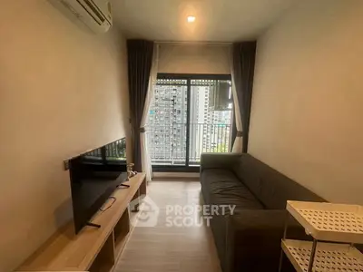 Modern living room with balcony view in urban apartment
