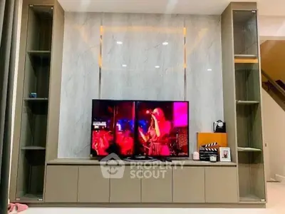 Modern living room with stylish TV unit and elegant decor