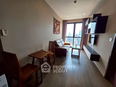 Modern living room with city view, featuring stylish furniture and wall-mounted shelves.