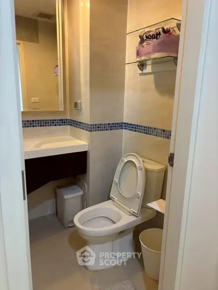 Modern bathroom with sleek fixtures and stylish tile accents