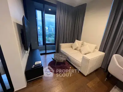 Chic modern living room with city view, cozy sofa, and stylish decor in urban apartment.