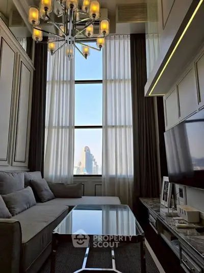 Luxurious high-ceiling living room with stunning city view and elegant chandelier.