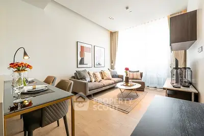 Modern living room with stylish decor and ample natural light