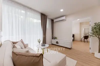 Bright and cozy living room with modern decor and natural light