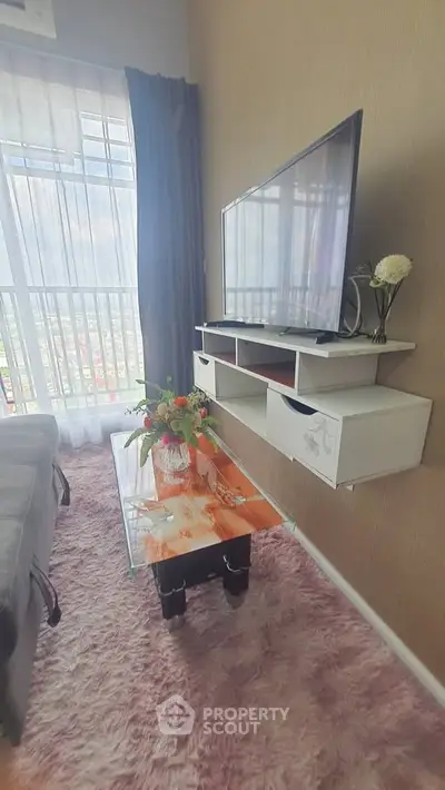 Stylish living room with modern TV setup and elegant decor