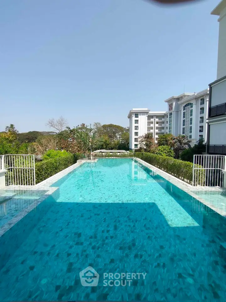 Luxurious residential pool with serene surroundings and modern architecture