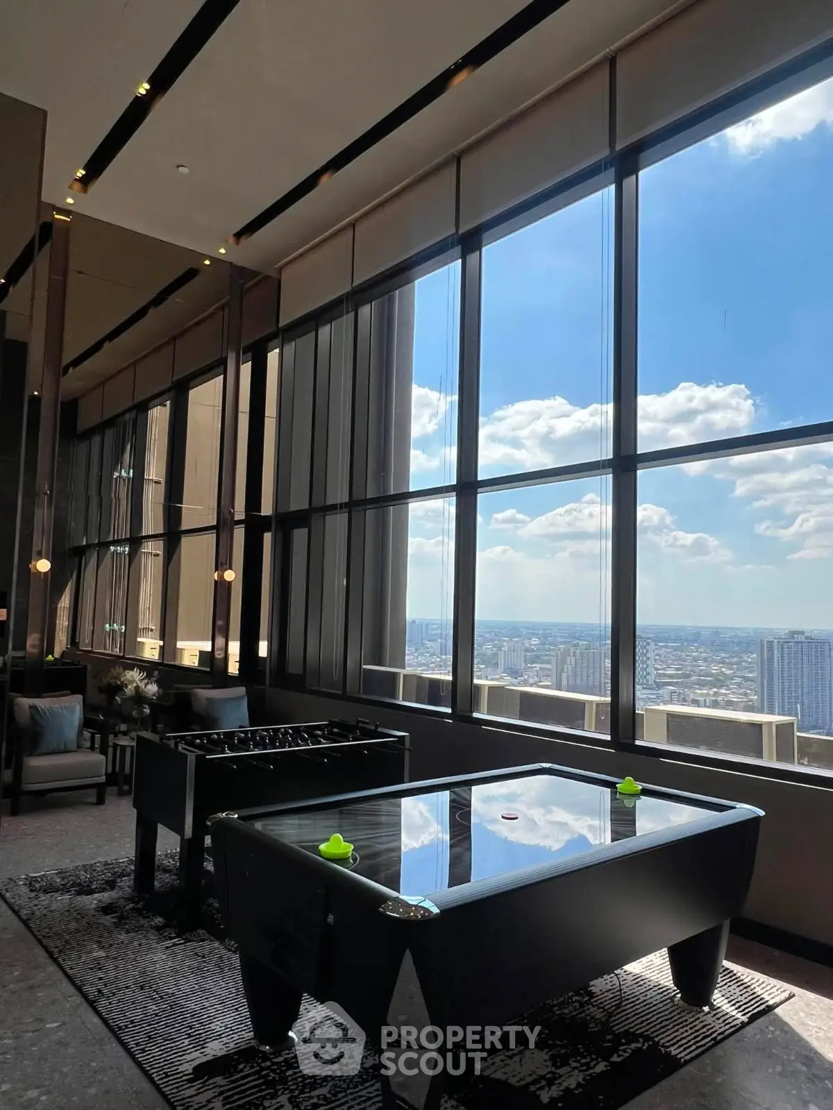 Luxurious high-rise building with stunning city views and recreational amenities.