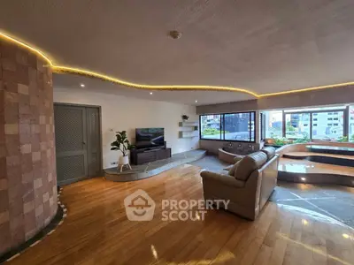 Spacious living room with modern design and panoramic city views