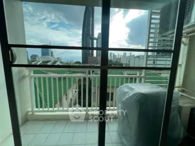 Modern balcony with city view and sleek railing design