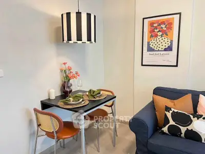 Charming living room with cozy dining area and stylish decor