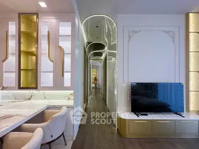 Luxurious modern living room with elegant marble accents and sleek built-in cabinetry.
