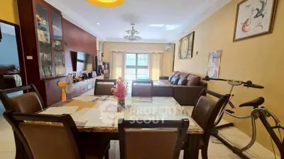 Spacious living room with dining area and exercise bike, perfect for modern living.