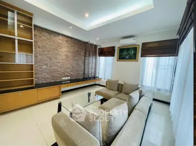 Spacious modern living room with elegant decor and natural light