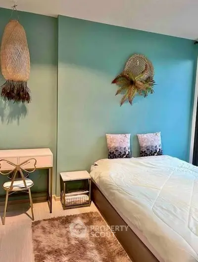 Chic bedroom with modern decor and cozy ambiance, featuring stylish wall art and elegant furnishings.