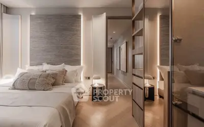 Luxurious modern bedroom with elegant lighting and cozy decor