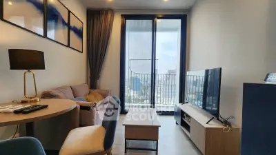 Modern living room with stylish decor and city view balcony
