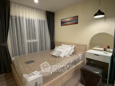 Cozy bedroom with modern decor and soft lighting, featuring a comfortable bed and stylish vanity.
