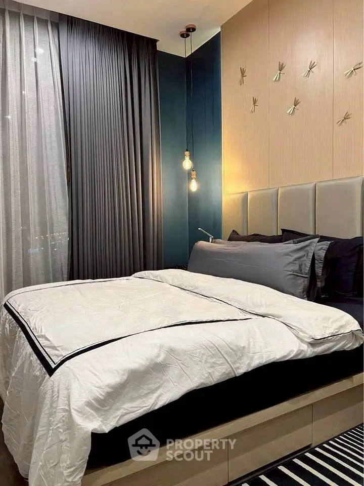 Luxurious modern bedroom with elegant lighting and stylish decor