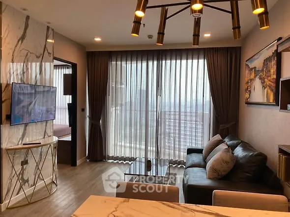 Luxurious living room with modern decor and stunning city view