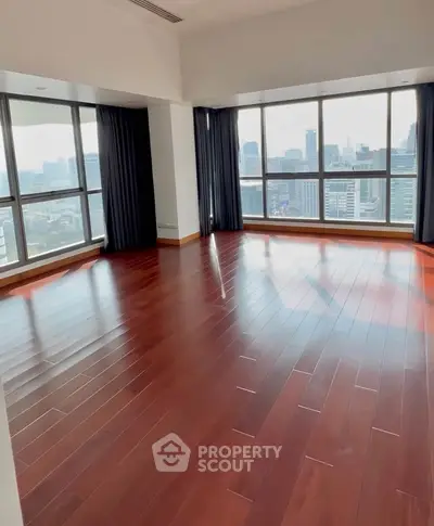 Spacious corner unit with stunning city views and elegant hardwood floors.