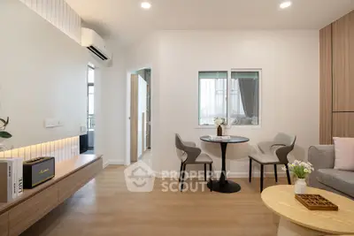 Modern living room with stylish furniture and natural light