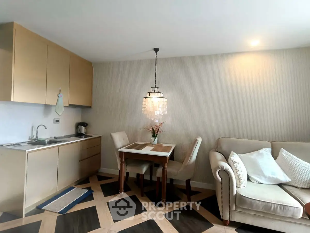 Chic modern living room with open kitchen and elegant dining area