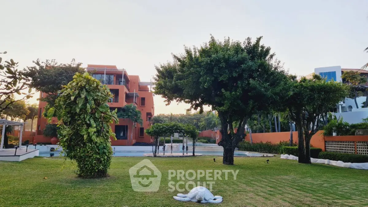 Luxurious garden view with modern building and lush greenery