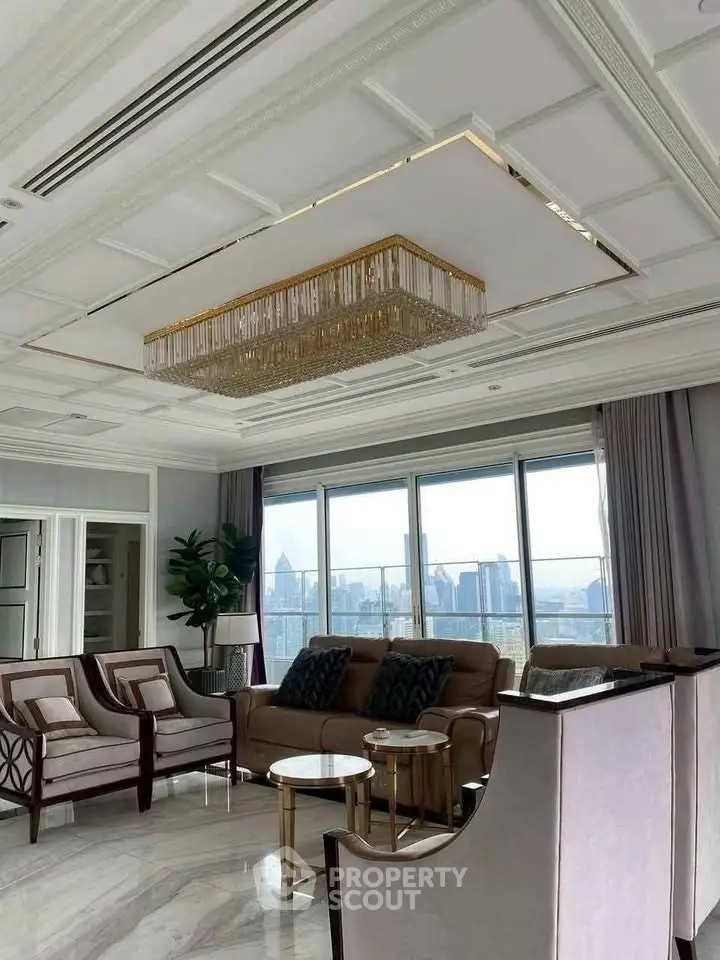 Luxurious living room with elegant chandelier and panoramic city view, perfect for sophisticated urban living.