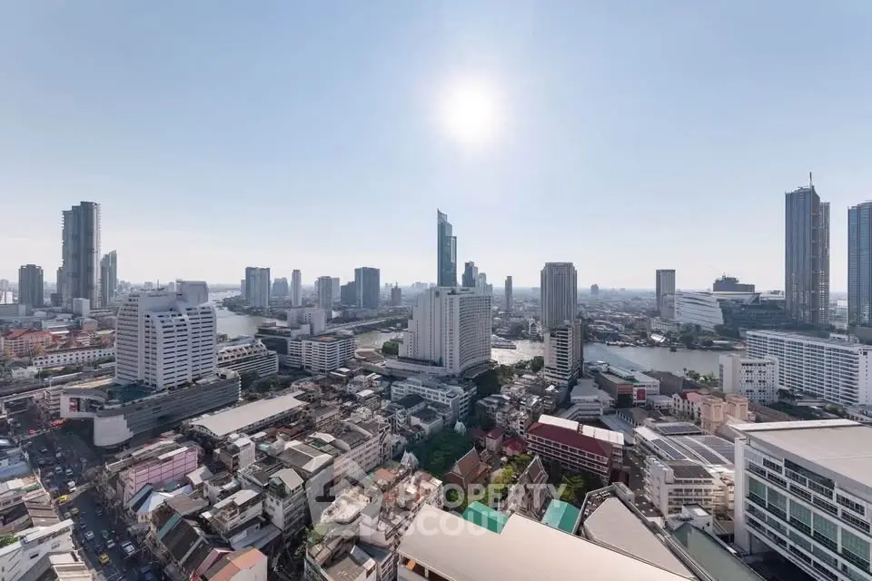 Stunning cityscape view showcasing modern skyscrapers and river, perfect for urban living enthusiasts.