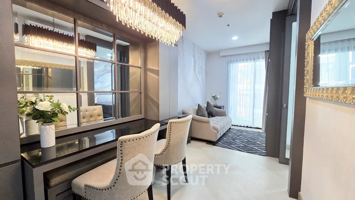 Luxurious living room with elegant decor and chandelier lighting
